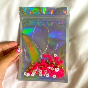 This is a DIY bracelet kit, string, beads & extra beads included for sizes S-L